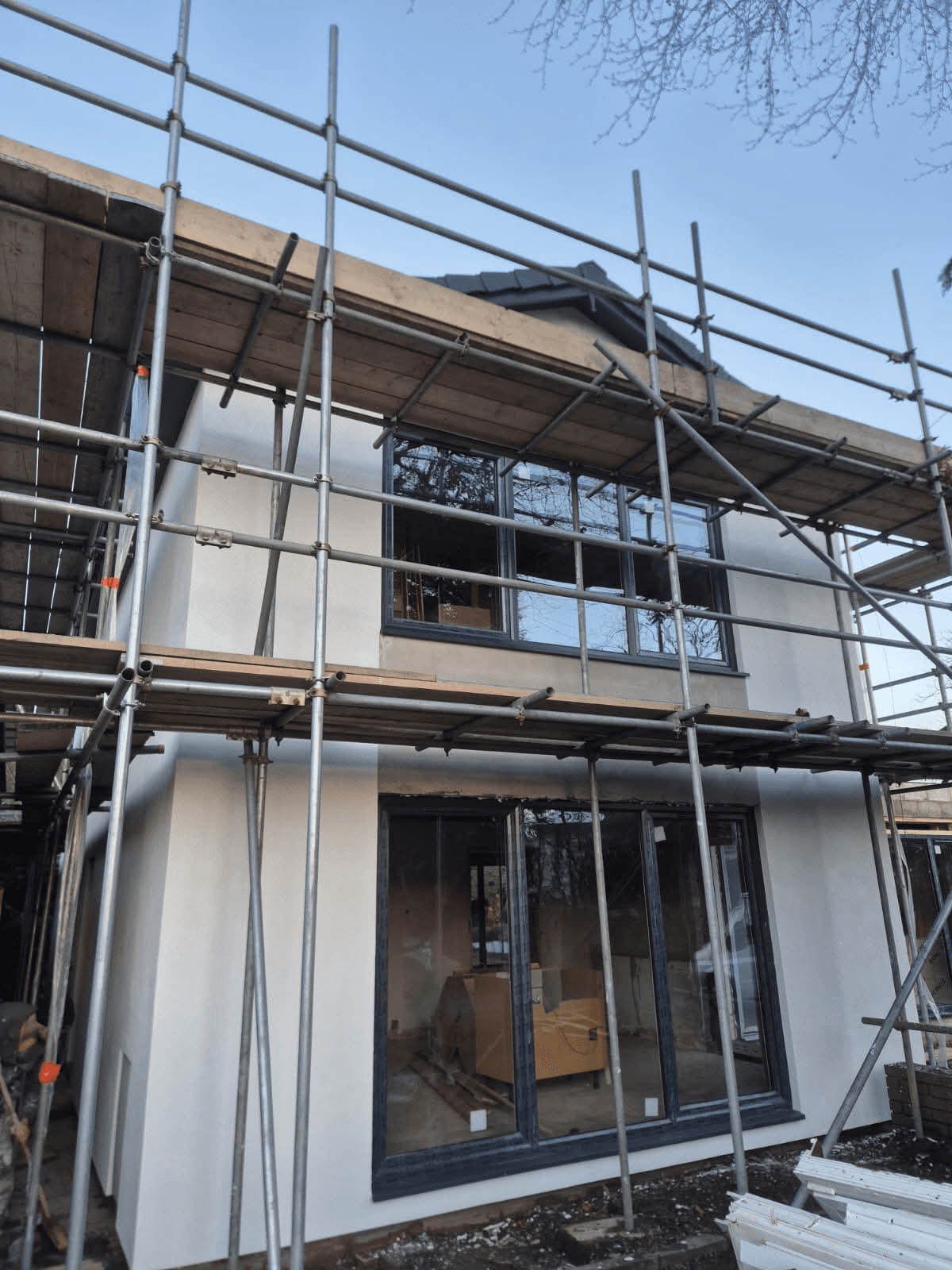 Two-storey new build with render in progress